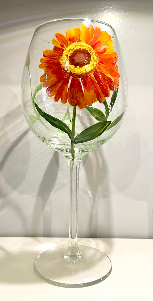 A Hand Painted Wine Glass from mpira.